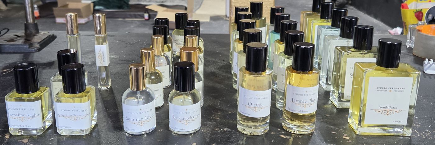 A table of finished client fragrances at the Studio Perfumers studio